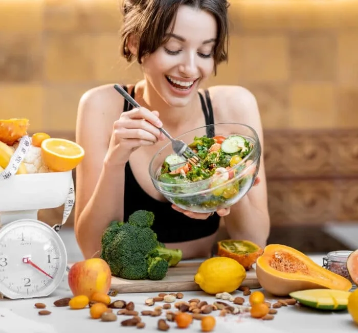 Woman enjoying a balanced, healthy meal